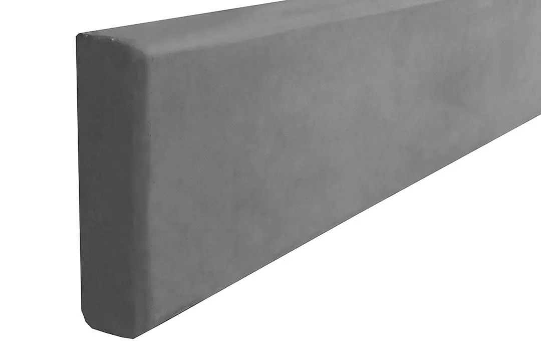 Concrete under fence plinths for retaining walls and fencing systems