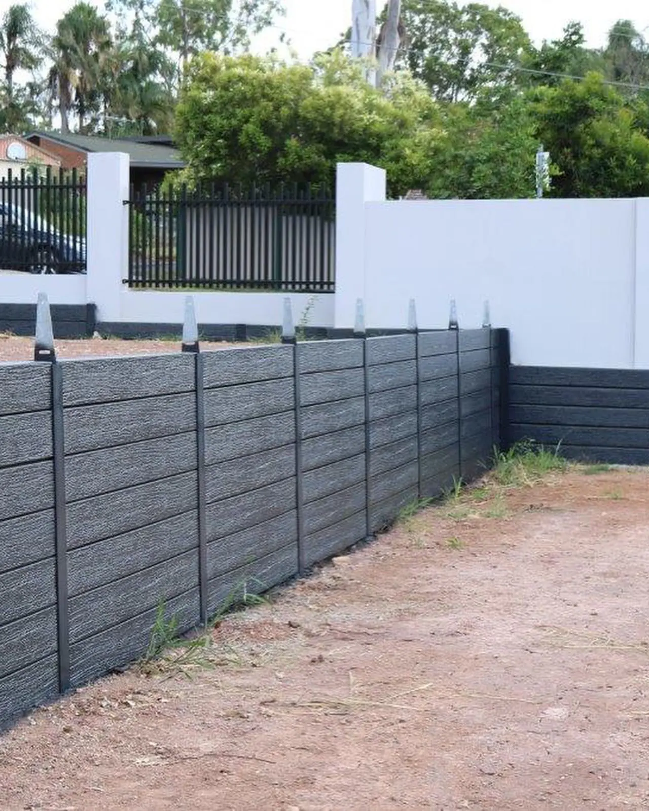 Premium all-black concrete sleepers used for modern retaining walls in Australia
